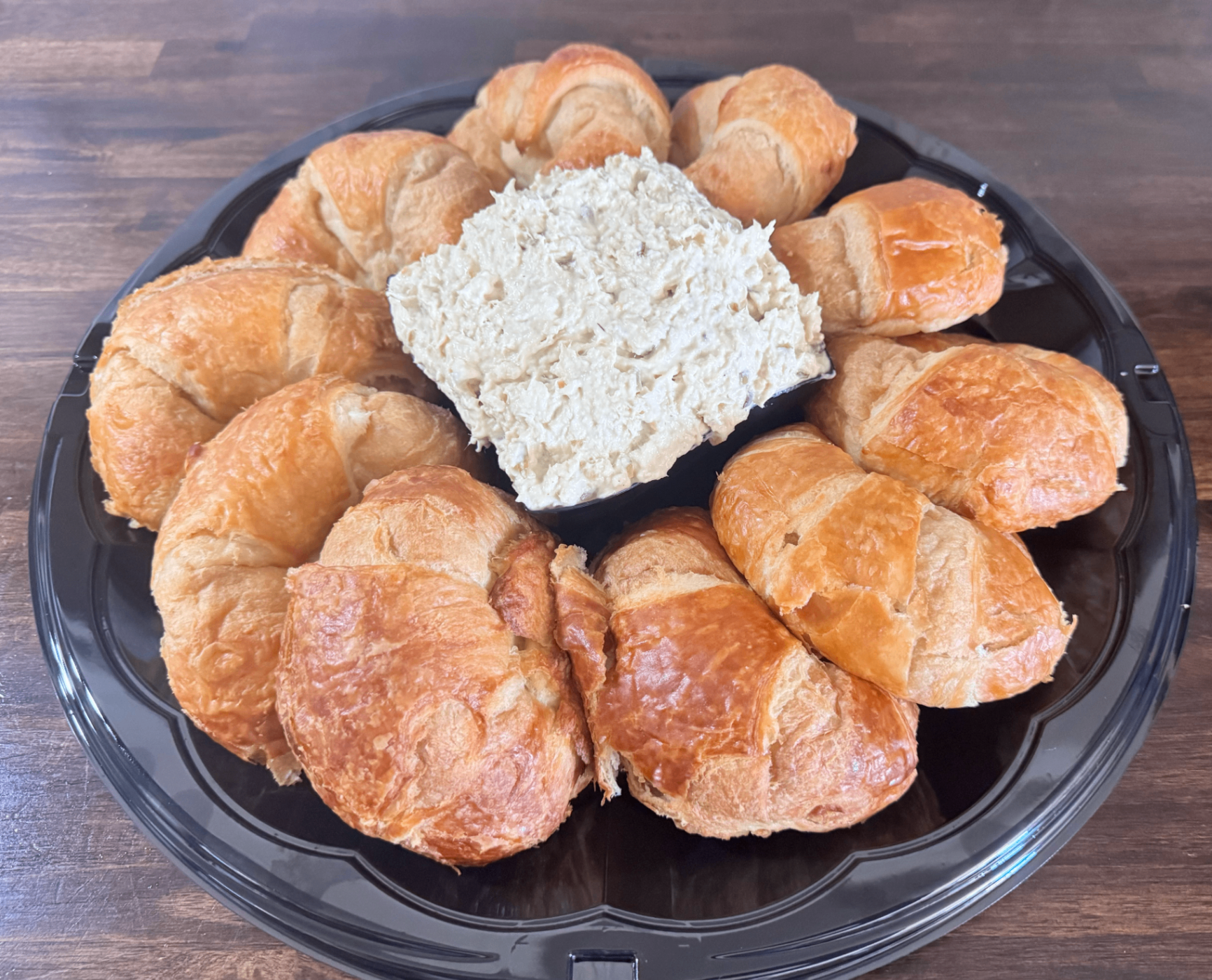 Chicken salad platter surrounded by flaky croissants