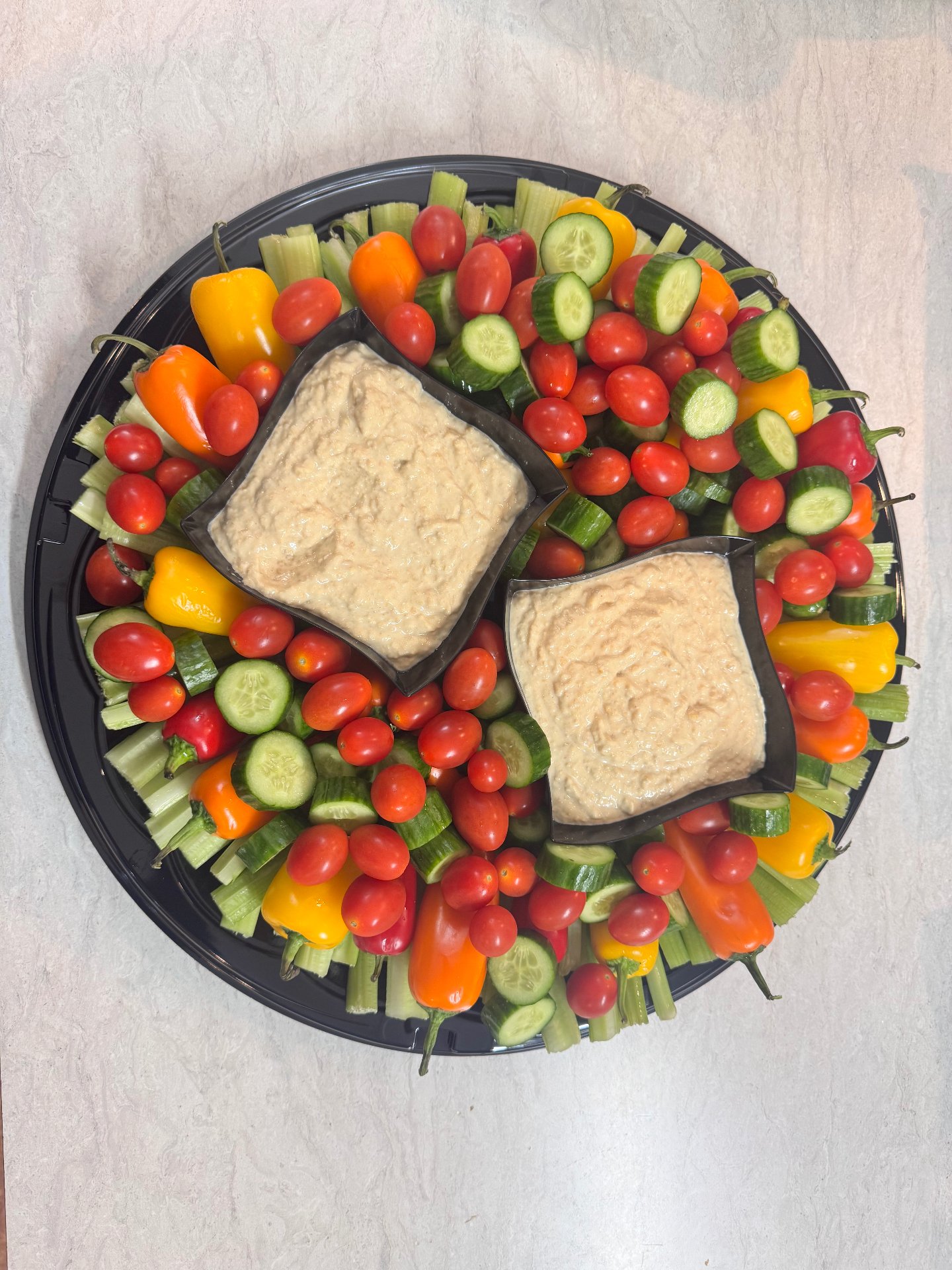 Fresh veggie tray with hummus